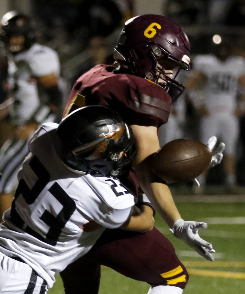 Sandwich's Nate Hill breaks up a pass to Richmond-Burton's Ryan Wisniewski during a Kishwaukee River Conference football game on Friday, Oct. 4, 2024, at Richmond-Burton High School.