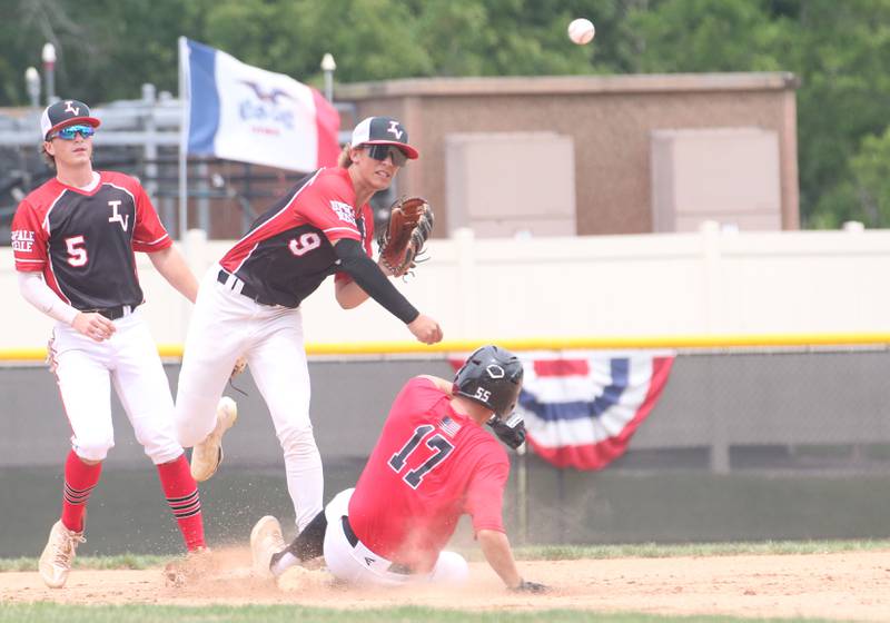Spring Valley's Geno Ferrari throws to first base after forcing out Burbank's Danny Coyle as teammate Gus Burr watches during the Central Regional Senior Baseball Regional tournament at J.A. Happ Field in Washington Park in Peru.