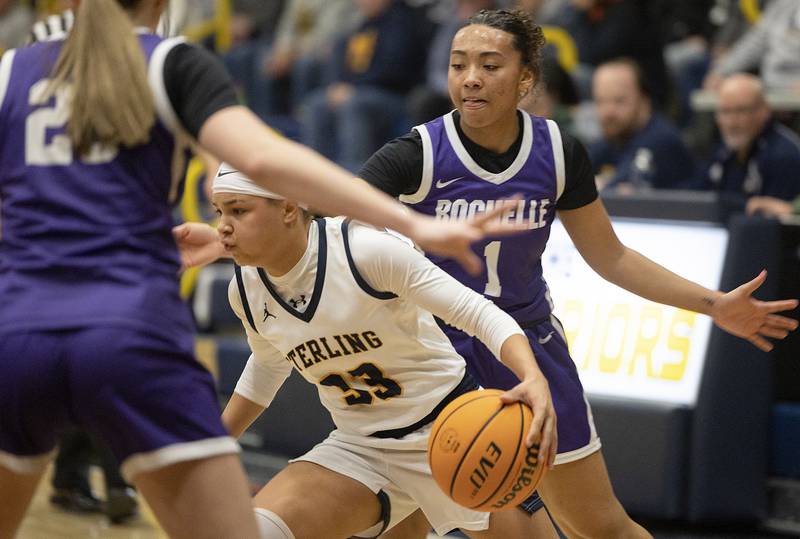 Sterling’s Joslynn James handles the ball against Rochelle Monday, Feb. 17, 2025, during the girls 3A regional semifinal game in Sterling.