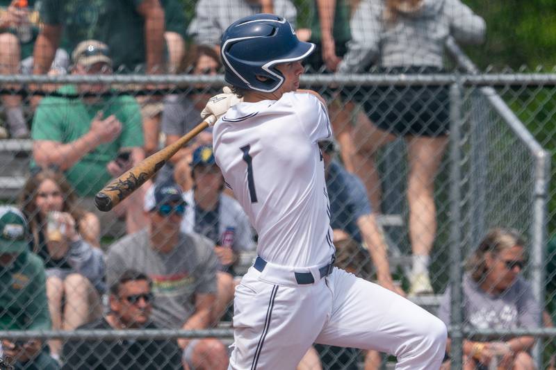 Oswego East's Michael Polubinski (1) drives in a run against Waubonsie Valley during the Class 4A Waubonsie Valley Regional final between Waubonsie Valley and Oswego Easy at Waubonsie Valley High School in Aurora on Saturday, May 27, 2023.
