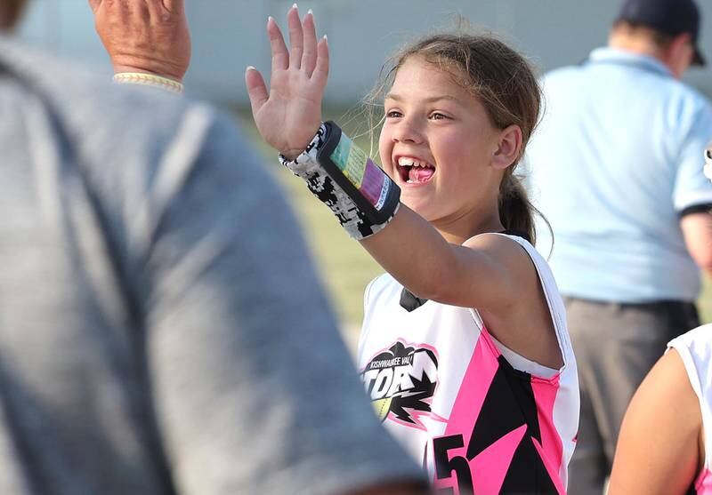 Kishwaukee Valley Storm 10u player Emerson Johnson is all smiles a she is congratulated after turning a double play Wednesday, June 21, 2023, during a scrimmage game against the Poplar Grove Power at the Sycamore Community Sports Complex. The Kishwaukee Valley Storm is hosting the Storm Dayz tournament this weekend which draws about 70 teams and runs Friday through Sunday in Sycamore.