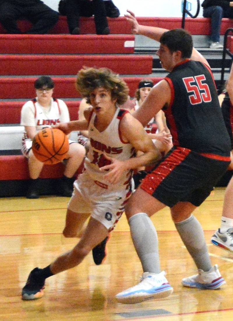 LaMoille sophomore Braden Fischer drives the lane in Tuesday's Senior Night game against Indian Creek.