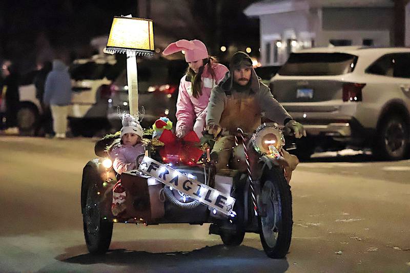 Andrew Schultz and family brought their rendition of a Christmas Story to the Erie annual Christmas Parade Saturday, Dec. 7, 2025.