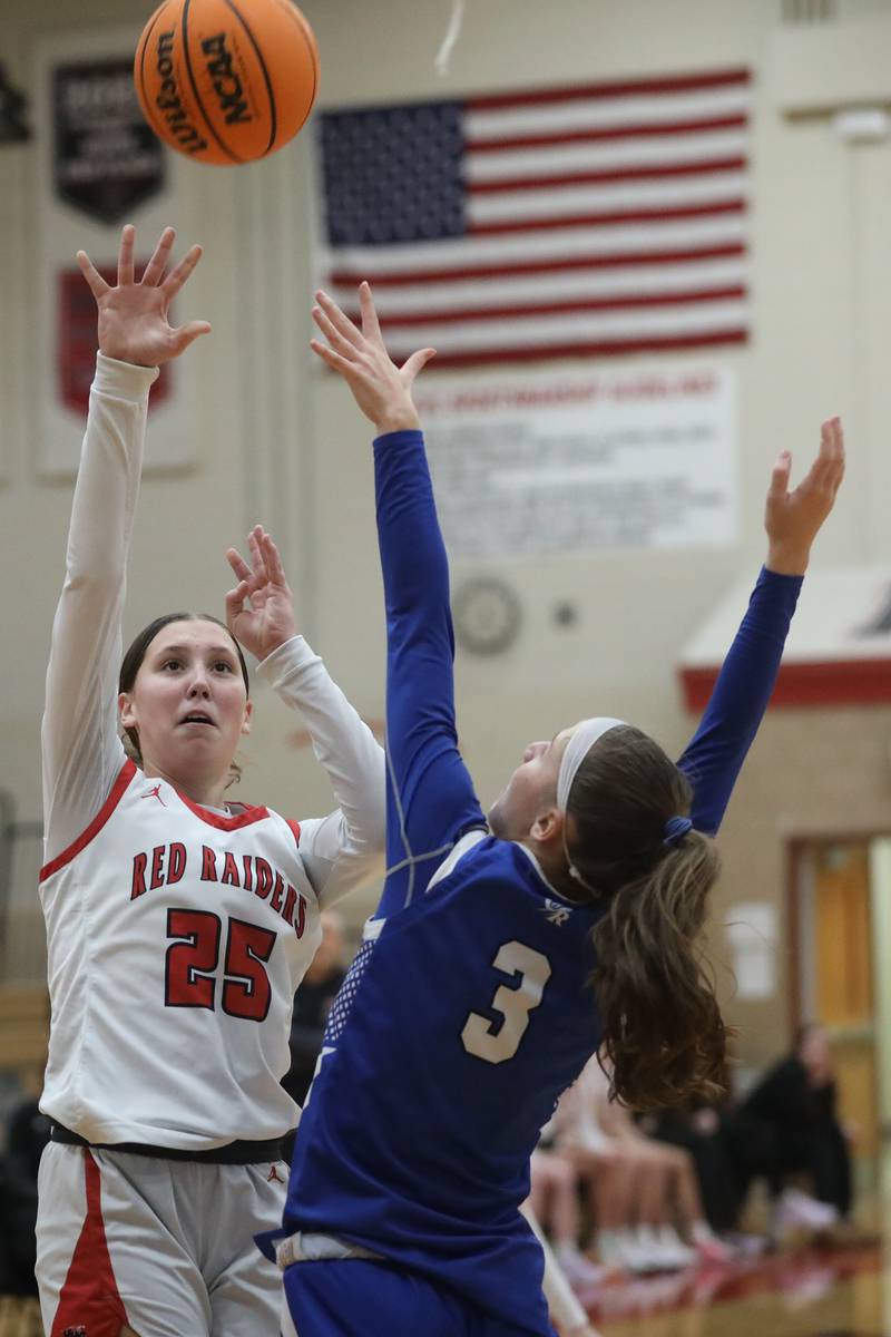 Huntley's Evie Freundt shoots the ball over Burlington Central's Julia Scheuer during a Fox Valley Conference girls basketball game on Tuesday Jan. 13, 2026, at Huntley High School.