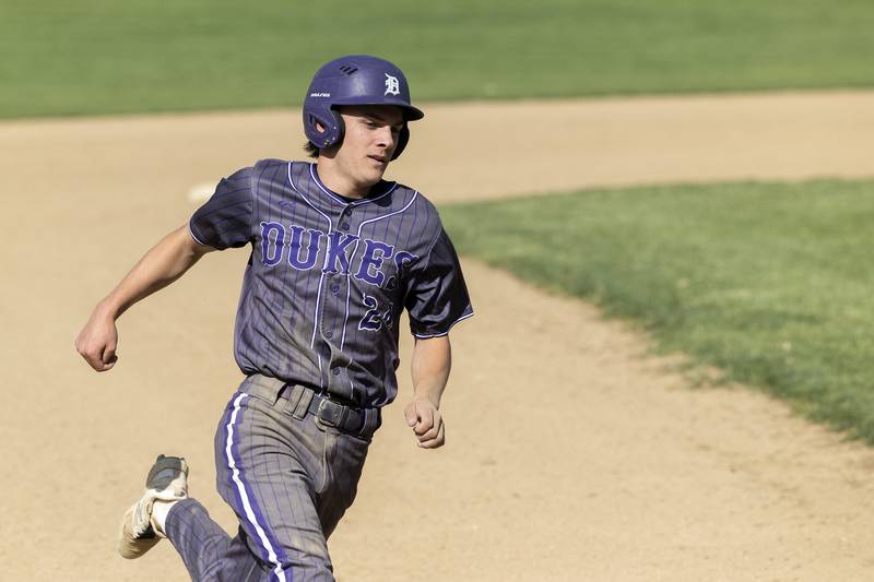 Dixon’s Brady Feit rounds third against Sterling Friday, May 23, 2025.