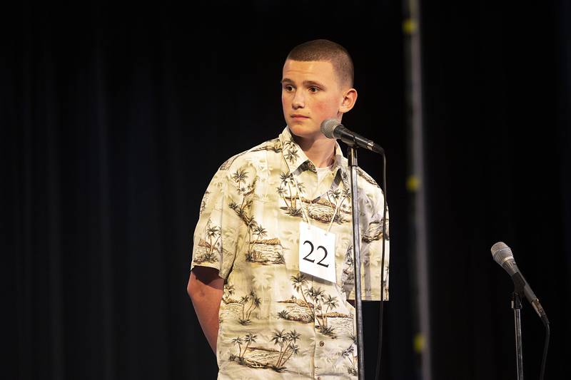 Montmorency School eighth grader AJ Moore appears on stage Thursday, March 9, 2023 during the Lee-Ogle-Whiteside Regional Spelling Bee.