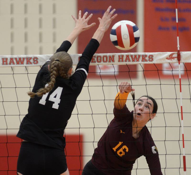 Stockton's Ireland Mensendike (16) drives a spike past Dixon's Leah Carlson (14) during the championship match at the Oregon Varsity Girls Volleyball Tournament on Saturday, Sept. 6, 2025 at the Blackhawk Center in Oregon.