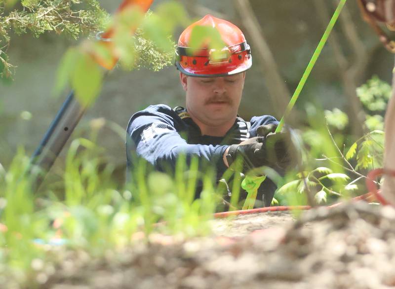 Ottawa firefighter Joe Ellena, climbs up the side of Wildcat Canyon during rope rescue training on Saturday, May 2, 2026 in Wildcat Canyon at Starved Rock State Park.