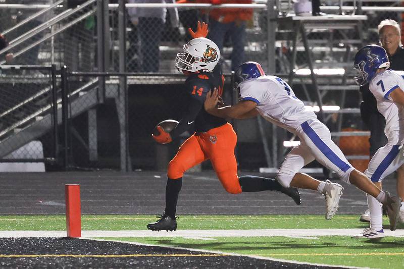 Plainfield East’s Shawn Harris scores against Joliet Central on Oct. 4, 20234 in Plainfield.