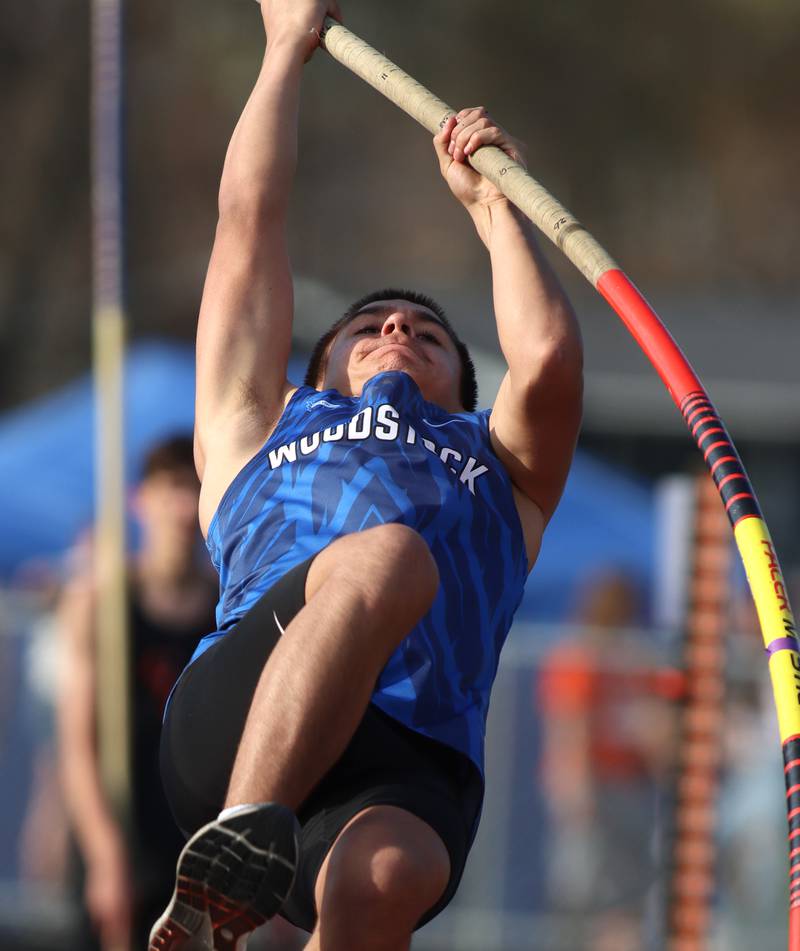 Woodstock’s Connor Calvin-Garcia clears ten feet in the pole vault during the McHenry County Track and Field Meet at McCracken Field on Thursday, April 24, 2025, in McHenry