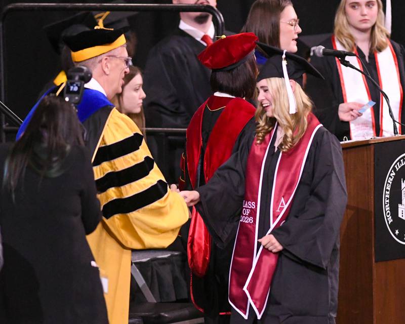 A Northern Illinois University is all smiles as she receiving her diploma on Saturday May 9, 2026, held at the Convocation Center in DeKalb.
