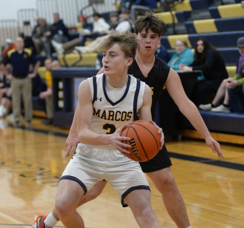 Polo's Gage Zeigler looks to pass during action against Ashton-Franklin Center on Tuesday, Jan. 2, 2024 at Polo High School.
