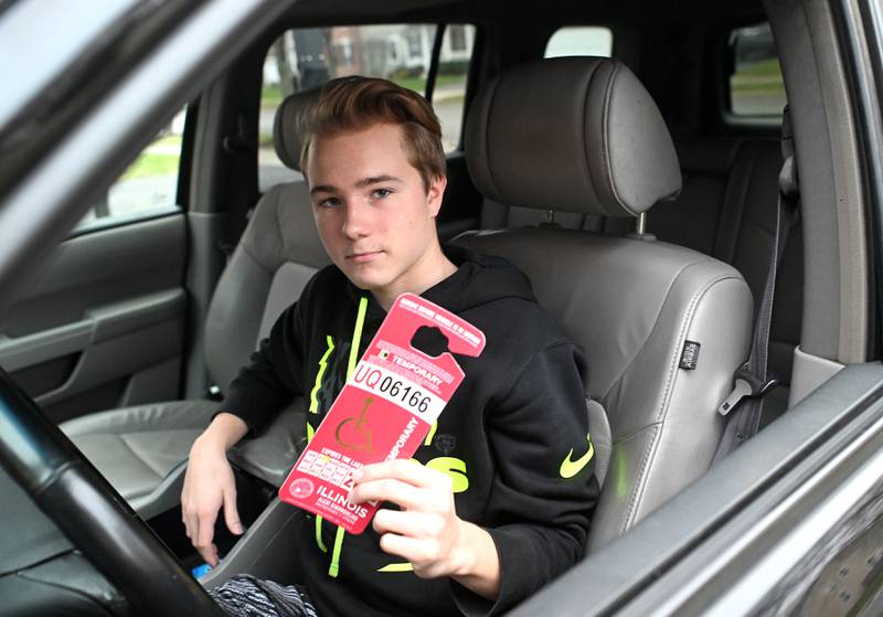 Gavin Hagge and his family are at odds with Burlington-based Central Unit School District 301 over whether he can use an accessible parking placard at his high school without a school parking pass.