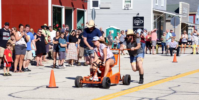 Team Daisy Dukes participates in the 2024 Maple Park Fun Fest Toilet Bowl Races on Saturday, Aug. 31, 2024 in Maple Park.