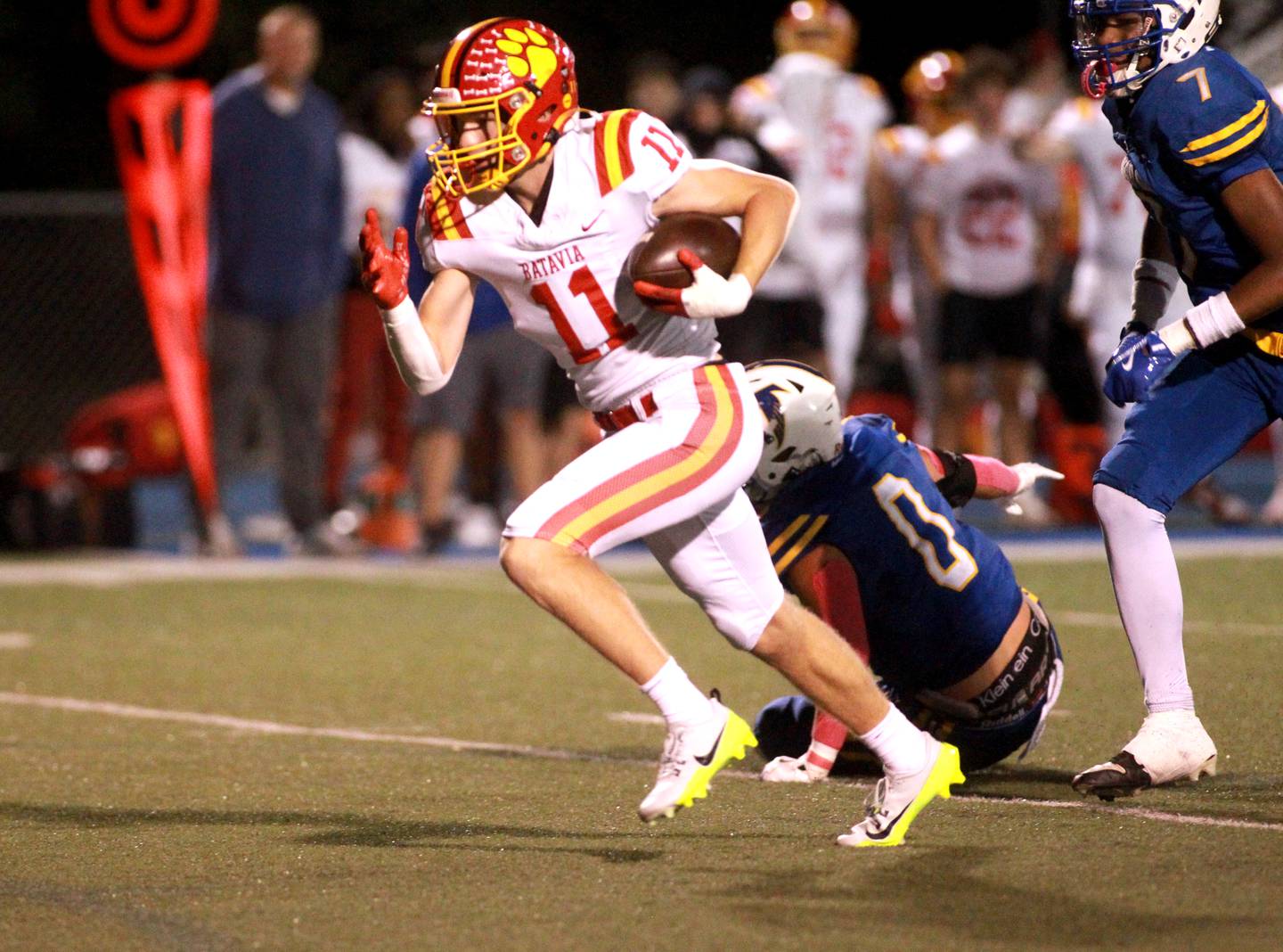 Batavia’s Brett Berggren runs the ball in for a touchdown during a game on Friday, Sept. 27, 2024 at Wheaton North.