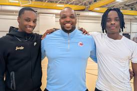 Elijah, Malachi Bell to join dad at Marian Central