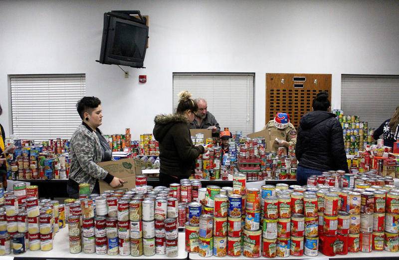 More than 4 tons of food were collected by the Sandwich Lions Club to help out families in need during the holiday season, as part of the annual Franklin Mall Christmas Project, sponsored by the Sandwich Lions Club.