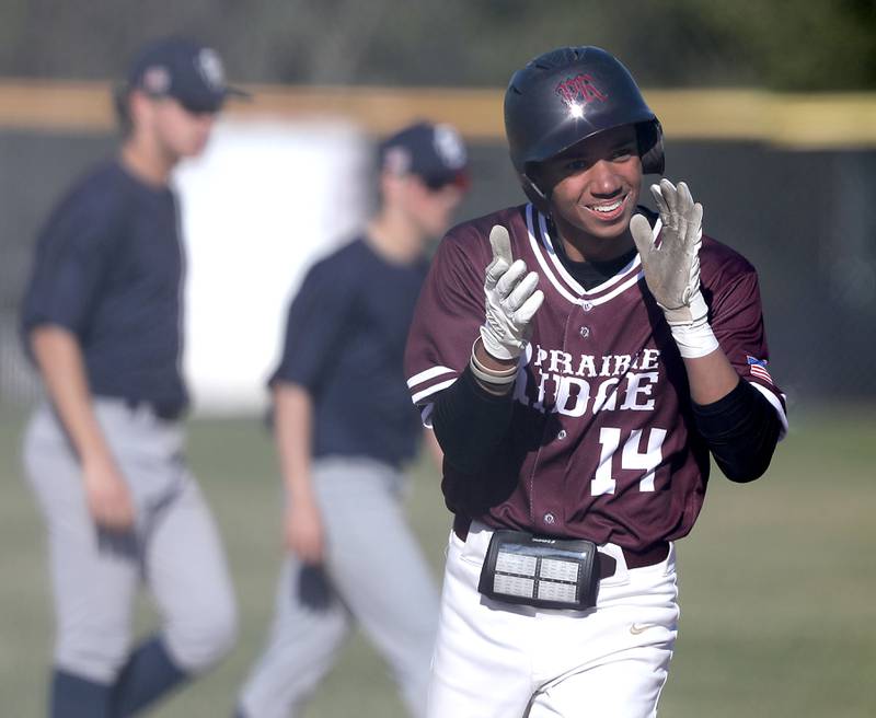 Prairie Ridge’s Cameron Davis celebrates his two-run home run during a Fox Valley Conference baseball game against Cary-Grove on April 8, 2026, at Prairie Ridge High School.