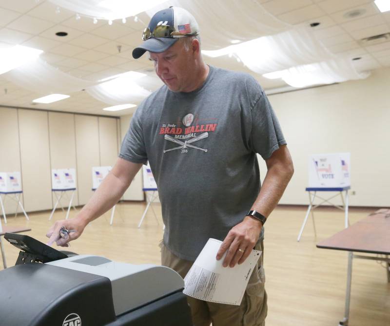 John Eggers casts his ballot at the Bureau County Metro Center during the Primary Election on Tuesday, June 28, 2022 in Princeton.