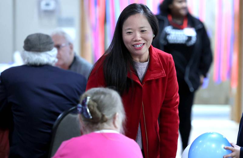Linh Nguyen, Democratic candidate for DeKalb County Clerk, talks to supporters Tuesday, Nov. 8, 2022, during an election night watch party at River Heights Golf Course in DeKalb.