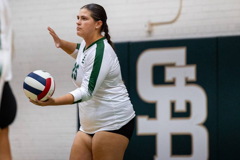 Ava Balestri (25) of St. Bede sets up serve on Thursday, Sept. 11, 2025 at Abbot Vincent Gymnasium in Peru.