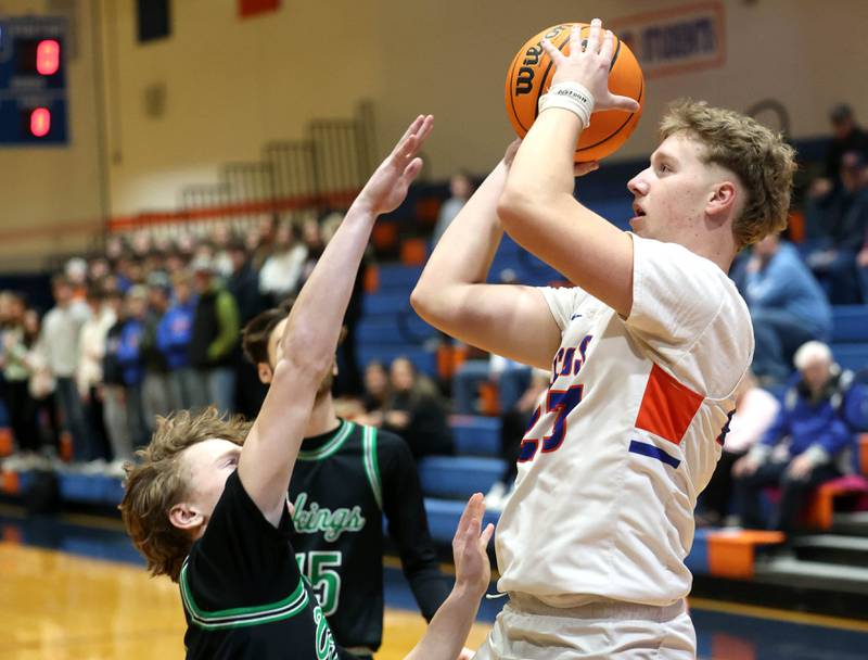 Genoa-Kingston's Hayden Hodgson shoots over North Boone's Collin McKibben during their Class 2A regional game Monday, Feb. 24, 2025, at Genoa-Kingston High School.