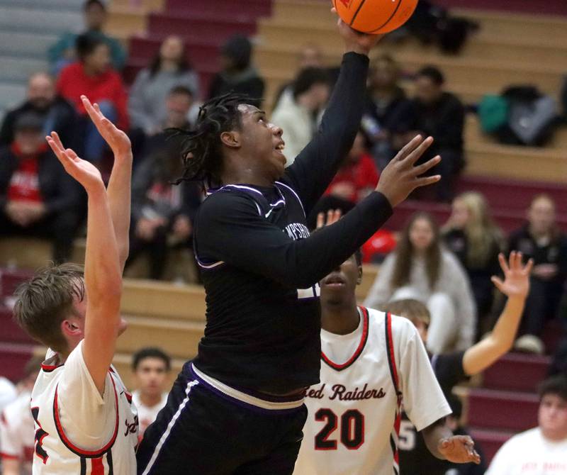 Hampshire’s Treysan Simmons glides to the hoop in varsity boys basketball on Friday, Dec. 19, 2025, at Huntley High School in Huntley.