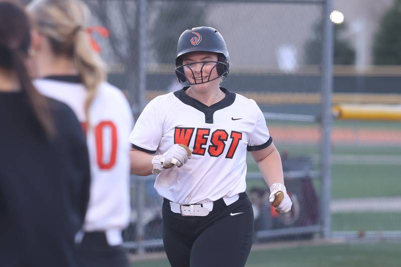 Lincoln-Way West’s Hannah Borchert heads home after a two run home run against Lockport in the WJOL Softball Tournament championship game on Thursday, April 2, 2026 in Joliet.