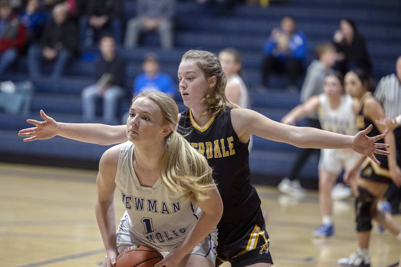 Newman’s Jessalin Johns looks to pass Thursday, Feb. 2, 2023 against Riverdale.