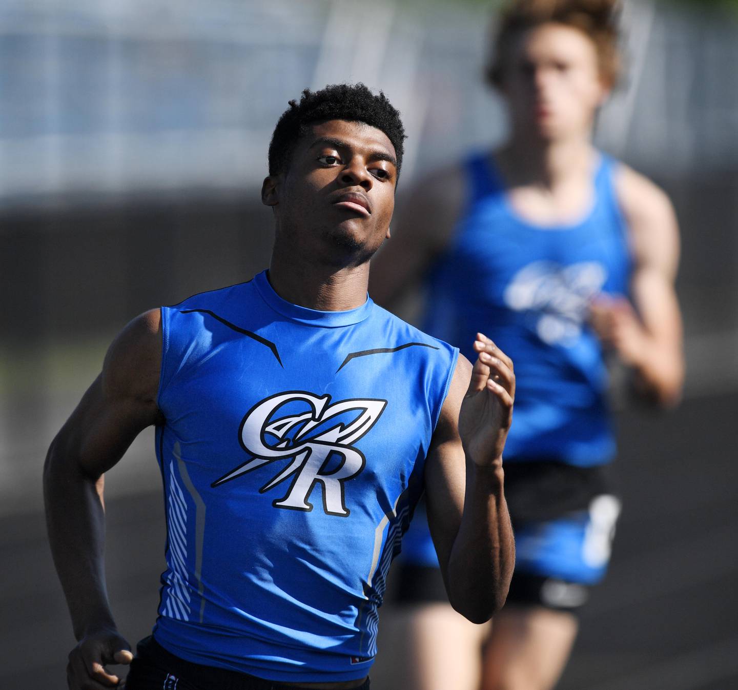 Burlington Central's Jacoby Haynes leads teammate Zac Schmidt in the 400-meter dash at a Class 2A boys track sectional meet in Glen Ellyn on Thursday, June 10, 2021.