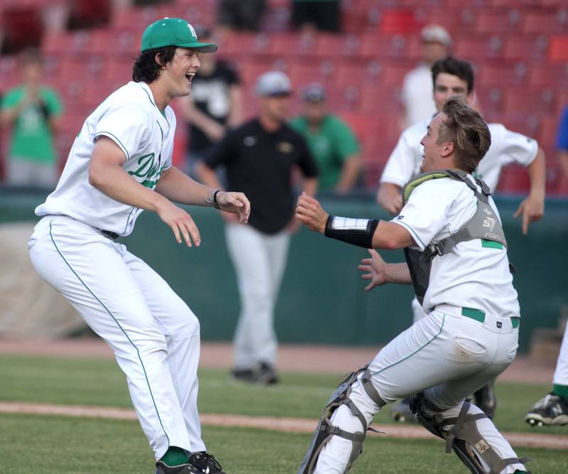 York pitcher Ryan Sloan and catcher Jack Rozmus celebrate their win and Sloane’s no-hitter in the Class 4A Kane County Supersectional against Hononegah at Northwestern Medicine Field in Geneva on Monday, June 5, 2023.