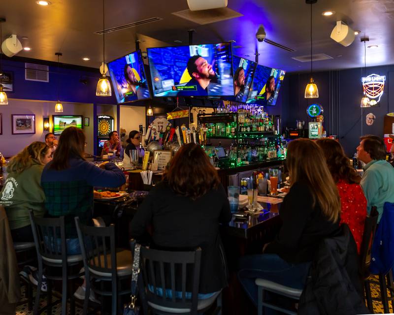 Patrons watch the NFL Draft at Max in McCook.  April 25, 2024.