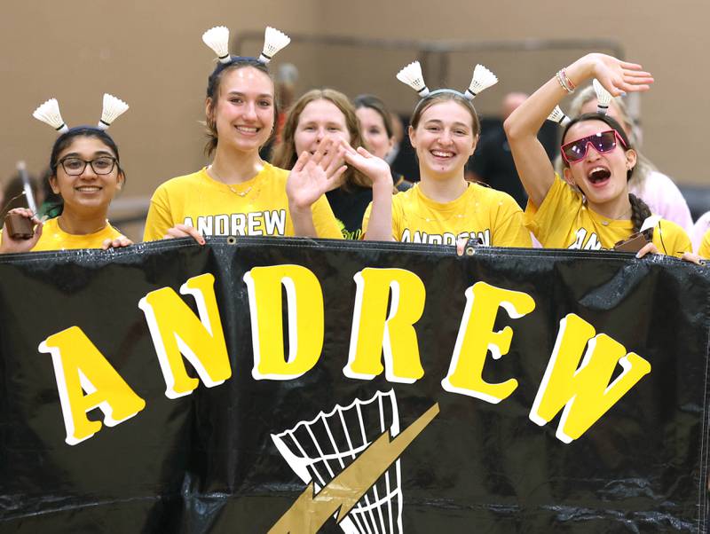 Members of the Andrew badminton team out of Tinley Park wave during the parade of teams Friday, May 10, 2024, prior to the IHSA State Badminton Finals at DeKalb High School.