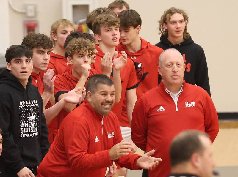 Hall coaches Mike Deangelo and Mike Filippini react after Noah Plym hits a three point basket against Fieldcrest during the Colmone Classic on Friday, Dec. 12, 2025 at Hall High School.
