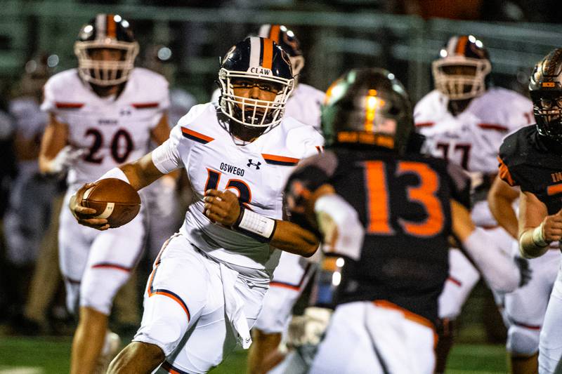 Oswegos Cruz Ibarra meets Minooka's Efrein Ramirez during a game Friday, Sept. 23, 2022 at Minooka High School