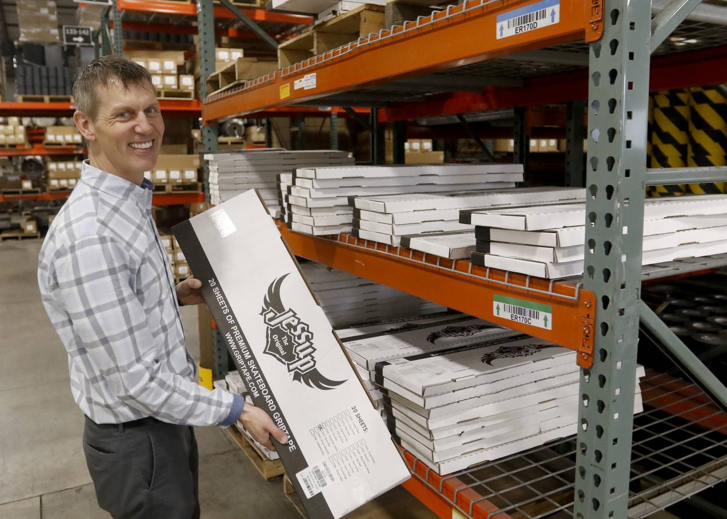 Jessup Manufacturing Company Vice President Scott Jessup talks about some of the products the McHenry company makes on Wednesday, March 1, 2023. In February, Jessup was named as one of the Top 50 companies of 2023 by Digital Output Magazine, partly because of its unique products, like grip tape for skateboards, graphics media and adhesives.