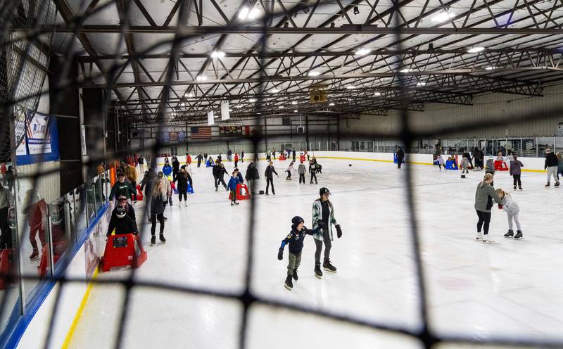 Attendees participate in open skate at Crystal Ice House in Crystal Lake on Friday, Jan. 3, 2025.