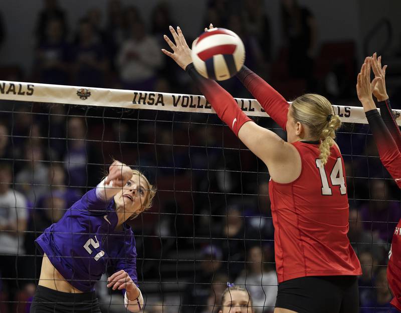 El Paso-Gridley's Abriel Smith hammers a shot against Timothy Christian's Audrey Williams Saturday, Nov. 16, 2024, in the Class 2A third place state volleyball match at CEFCU Arena in Normal.