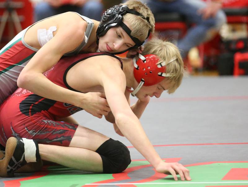 L-P's Austin Herron wrestles Streator's Nick Pollett during a meet on Wednesday, Dec. 13, 2023 in Sellett Gymnasium at L-P High School.