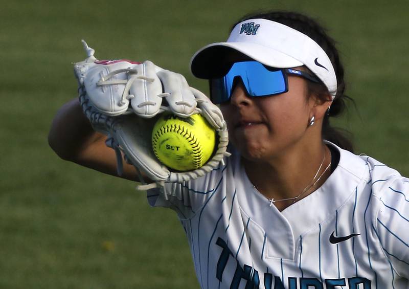 Woodstock North's Hailey Campos catches a line drive during a Kishwaukee River Conference softball game against Marengo on Tuesday, April 28 , 2026, at Woodstock North High School.