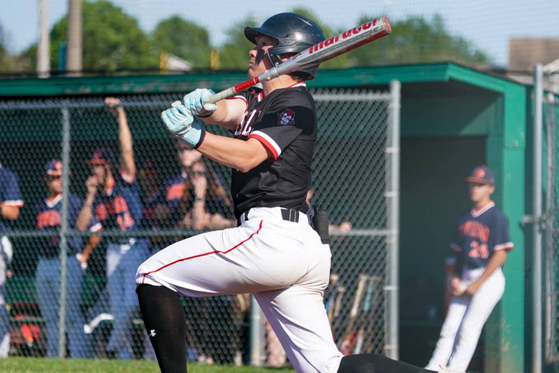 Hinsdale Central's Patrick Connors (5) hits a two run double  against Oswego during a Class 4A Waubonsie Valley Regional semifinal baseball game at Waubonsie Valley High School in Aurora on Wednesday, May 22, 2024.