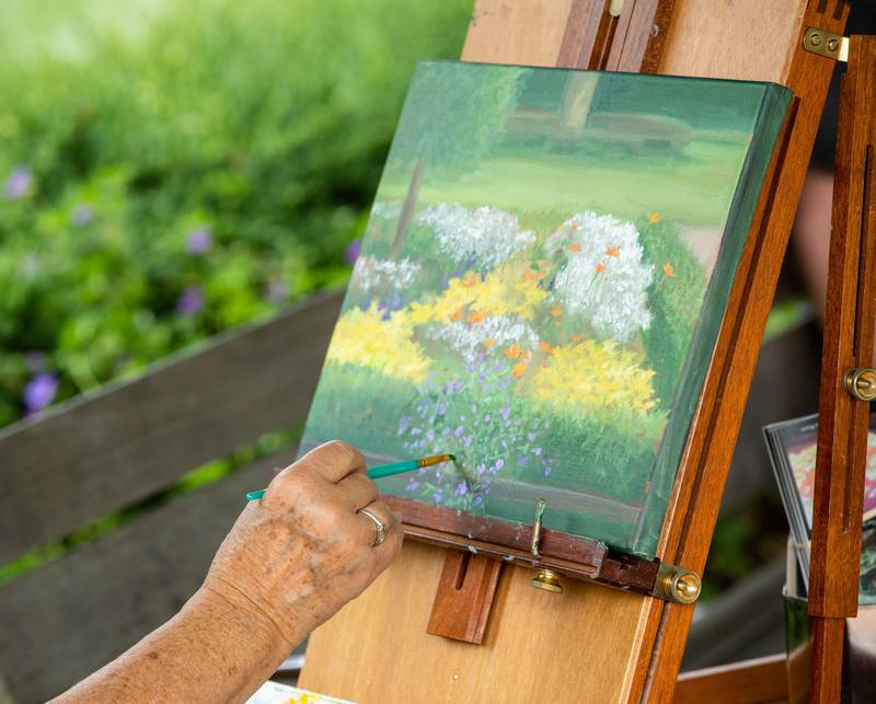 Painter Marge Hall’s floral portrait she painted during the Voyage en France Fest at Cantigny in Wheaton on Sunday, July 16, 2023.