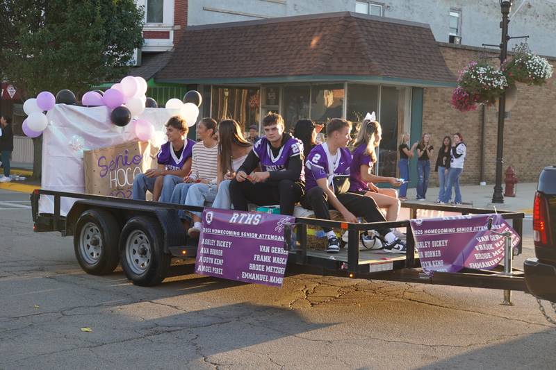 The RTHS senior Homecoming court rides in the Rochelle Township High School Homecoming parade on Thursday, Sept. 25, 2025 in downtown Rochelle.
