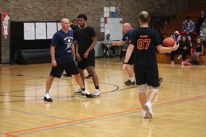Andrew Sperry (right) takes to the court Monday, Dec. 5, 2022 in the Toys for Tots community basketball game.