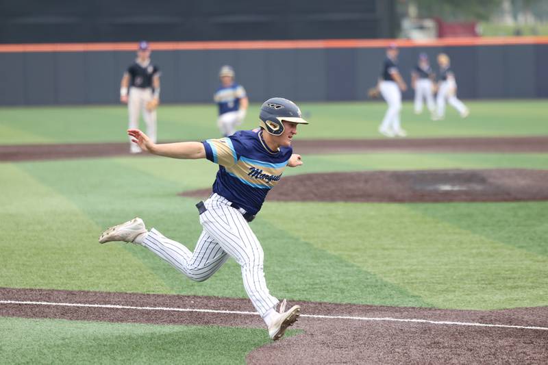 Ottawa Marquette’s Grant Dose cruises home to score during the Crusaders' 16-1 victory over Lexington in the IHSA Class 1A State semifinal on Friday, June 6, 2025.