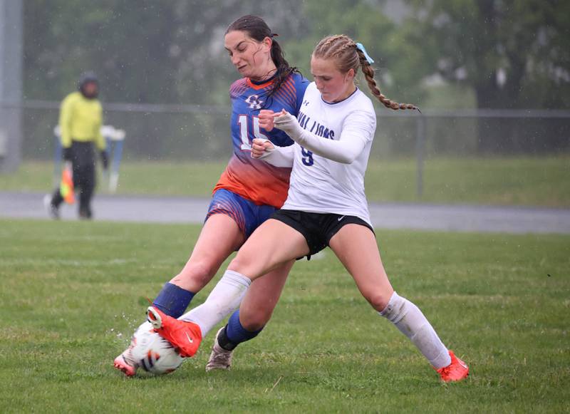 Genoa-Kingston's Samantha Wendt (left) and Rockford Christian's Ava Reese collide at the ball Tuesday, May 20, 2025, during their Class 2A regional final game at Rockford Christian High School.