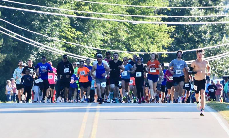 Race winner Elijah House (right) of Sheffield leads the pack in the 2025 Underground Railroad 5K.