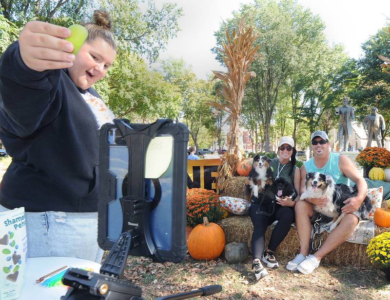 Dogs could get a family portrait taken with their owners during Bill’s Barktoberfest Saturday at Washington Square in Ottawa. The festival honors the late Bill Walsh Sr., an avid dog lover and community supporter. All proceeds benefit Bill’s Barking Lot, the new city dog park at 401 E. Lafayette St.