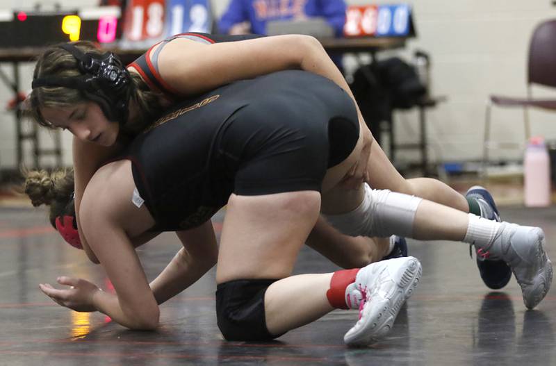 Huntley’s Aubrie tries to control Huntley’s Cordelia Adame in the 130-pound match of a nononference wrestling meet on Wednesday, Jan. 22, 2025, at Huntley High School.