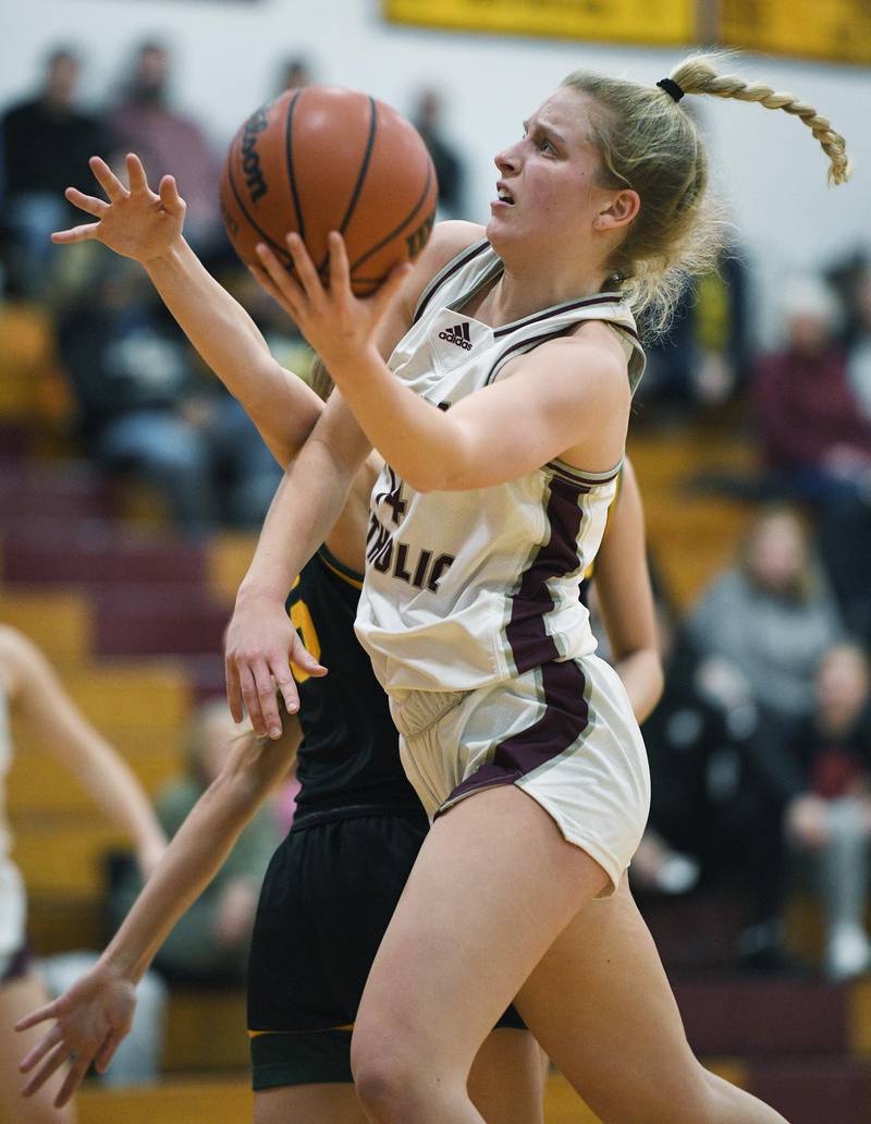 Montini’s Shannon Blacher scores against Fremd in a girls basketball game in Lombard on Monday, January 23, 2023.
